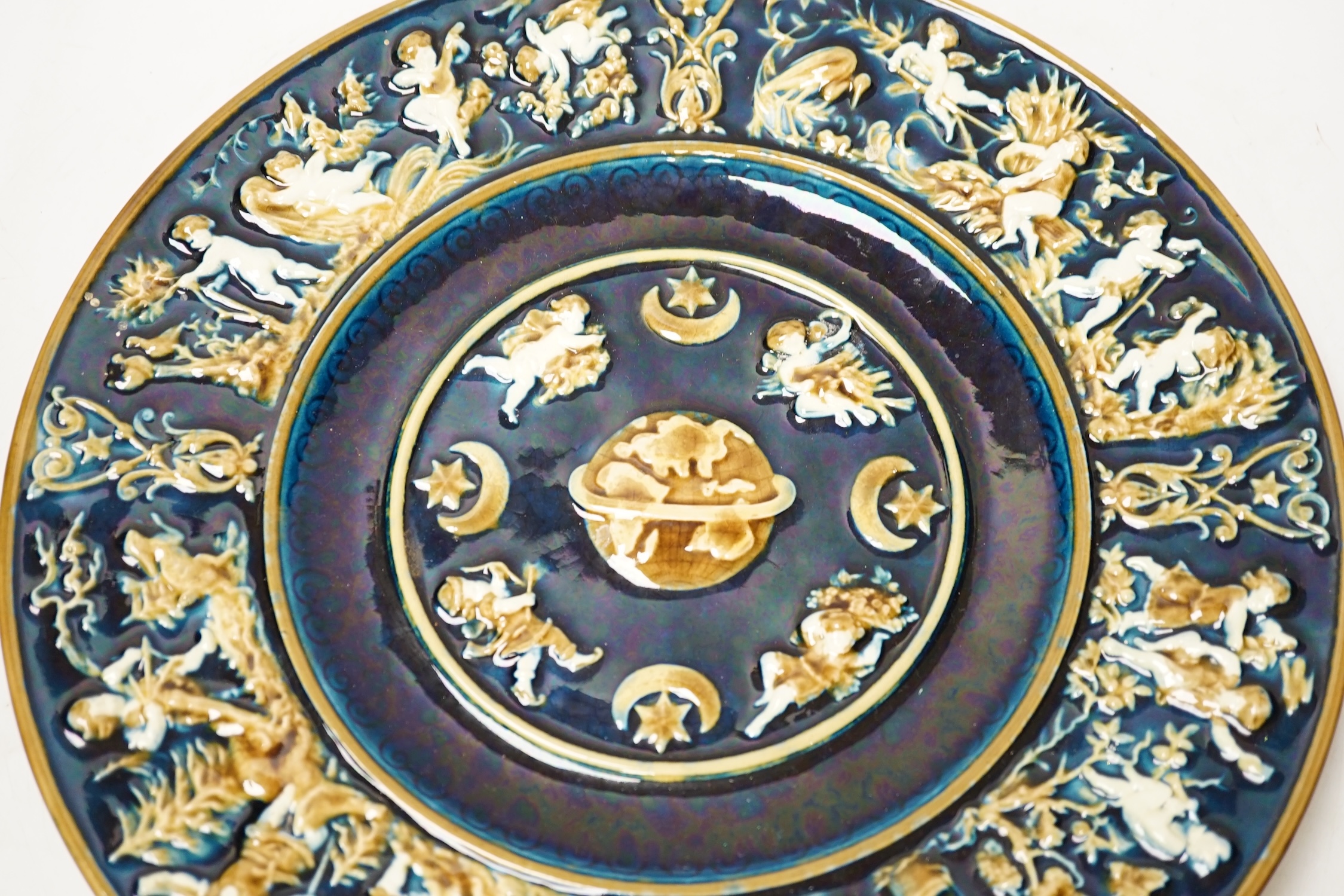 A late 19th century Schulz Blansko majolica relief wall plate, 36cm in diameter. Condition - good